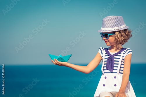 Child enjoys a summer vacation at the sea