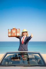 Poster - Successful young businesswoman on a beach