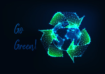 Wall Mural - glowing low polygonal earth globe and green recycle sign and text message go green on dark blue.
