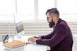 © satura_ - Illustrator, designer and technology concept - Side view handsome man with beard working on at the computer