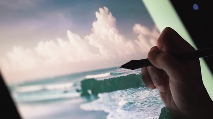 Wall Mural - Creative Digital artist photographer edit his artwork on interactive tablet computer in night home office.