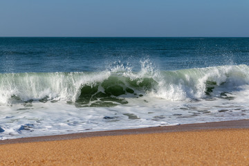 Wall Mural - Foamy Atlantic ocean water, Portugal coast.