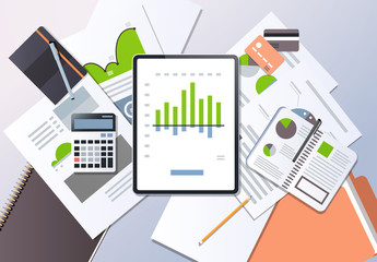 Aufkleber - financial report investment business finance concept top angle view desktop tablet screen paper docu