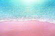 Leinwandbild Motiv pink sandy beach and soft blue ocean wave summer concept background