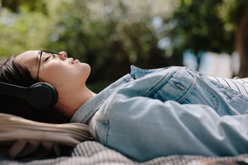 Young woman relaxing under the sun