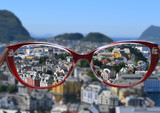 Fototapeta Nowy Jork - optical red glasses enhance the beautiful landscape and make the perception better