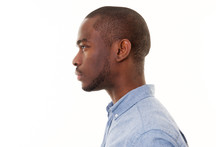 Close Up Profile Of Handsome Young Black Man Against Isolated White Background