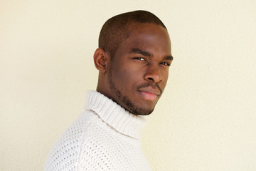 Wall Mural - side portrait of handsome african american man in sweater