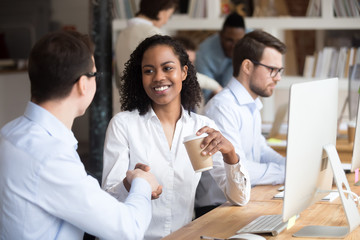 Sticker - Diverse workers greeting each other shaking hands in coworking office