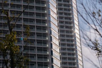 An apartment building reflects the sun