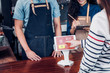 © weedezign - customer self service order drink menu with tablet screen at cafe counter bar,seller coffee shop accept payment by mobile.digital lifestyle concept