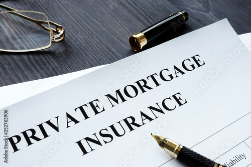 Fotomural Private Mortgage Insurance PMI form with pen.