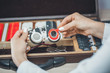 © vdeineka - doctor ophthalmologist chooses lenses to correct  patient's vision. Ophthalmologic equipment. Medical examination at hospital