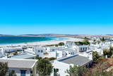 Fototapeta  - Scenic view of the picturesque town Paternoster with white houses and the turquoise ocean shoreline.