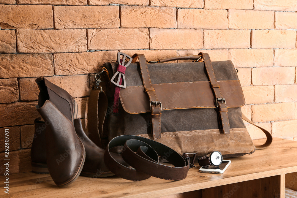 Set of male accessories on table