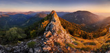 Fototapeta Góry - Mountain autumn panorama at sunset with forest and rocks.