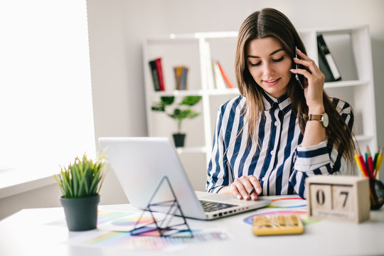 Young perspective web designer and blogger in modern office