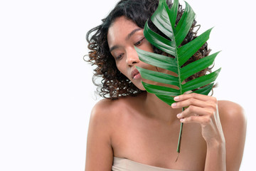 Beautiful young Asian dark-skinned female enjoy nature, white background