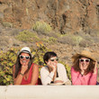 © simona - Happiness concept with three young friends women together with hats and sunglasses in summer day laughing and having fun - cheerful female people caucasian - summer and vacation
