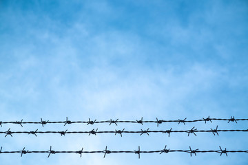 Blue sky and freedom behind the wall