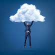 © gearstd - Businessman hanging in the air holding white cloud with both hands