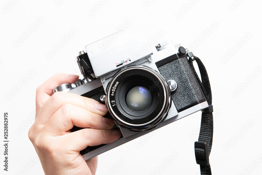 1960年代フィルムカメラ片手持ち Stock Photo | Adobe Stock