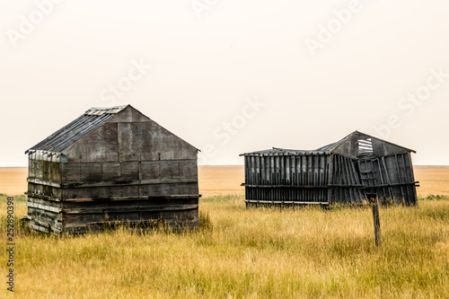 A Sign Of The Times Run Diown Farm Out Buildings And Barns