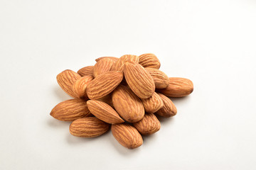 Sticker - Closeup of almonds, isolated on the white background.