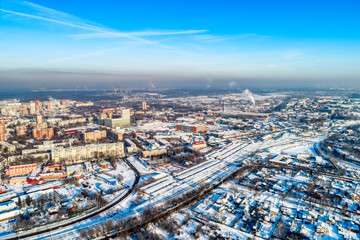 Aerial view of the modern city district. Winter, sunny day