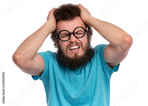 Crazy Bearded Man With Funny Curly Hair In Eye Glasses
