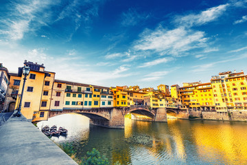 Wall Mural - Scenic view on Ponte Vecchio in Florence, Italy, on a summer day. Colorful travel background.