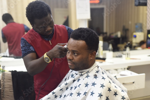 Black Man In The African Barbershop Cute Black Man Makes A