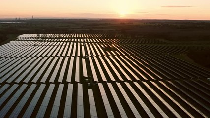 Wall Mural - Aerial view over a solar farm