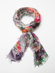 Wall Mural - Multicolor scarf on white background. Top view.