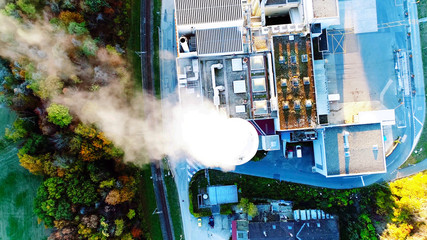 Air pollution smoke from factory chimneys, aerial view