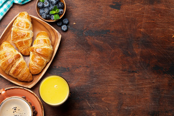 Canvas Print - Coffee, juice and croissants breakfast