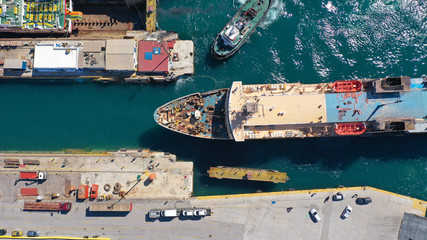 Wall Mural - Aerial drone top view photo of industrial shipyard located in mediterranean port