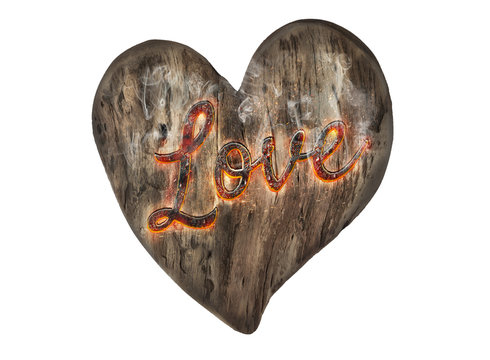Wooden Heart with love message on fire - w/clipping path Love word engraved into a heart shaped wood