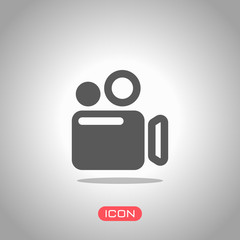 Poster - simple video camera icon. icon under spotlight. gray background
