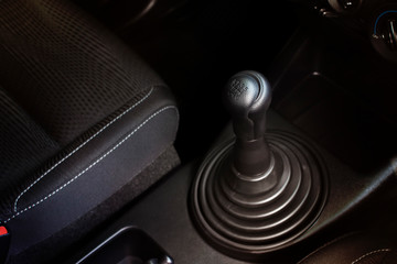 gear stick of manual transmission car with 6 position,selective focus. automotive part concept.