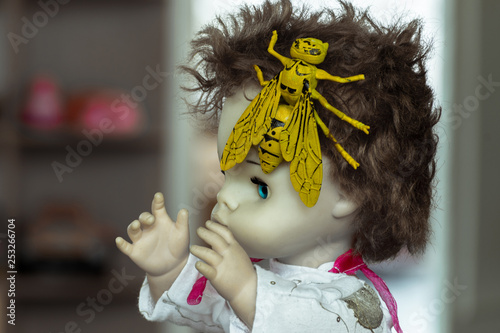 creepy doll with big eyes