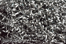 A Lot Of Metal Shavings After Working On A Milling Machine Or CNC Machine. Metal Shavings Texture