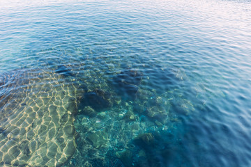 clear transparent sea water on sunny day, barcelona, spain