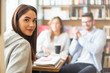 © Stock Rocket - Smiling female student in library