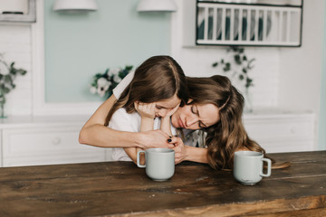 Wall Mural - mother calms her daughter