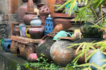 Old colored pots background of Bali, Indonesia.