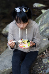 Wall Mural - Asian woman eat salad