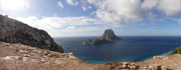 Wall Mural - A beautiful sunset on the island of Es Vedra, Ibiza