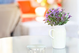 Fototapeta  - flower vase on glass table