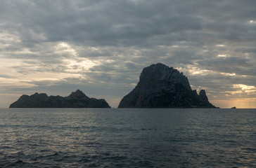 Wall Mural - A beautiful sunset on the island of Es Vedra, Ibiza